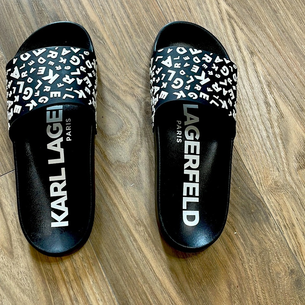Karl Lagerfeld slides. These slides are a size 7 in women’s.